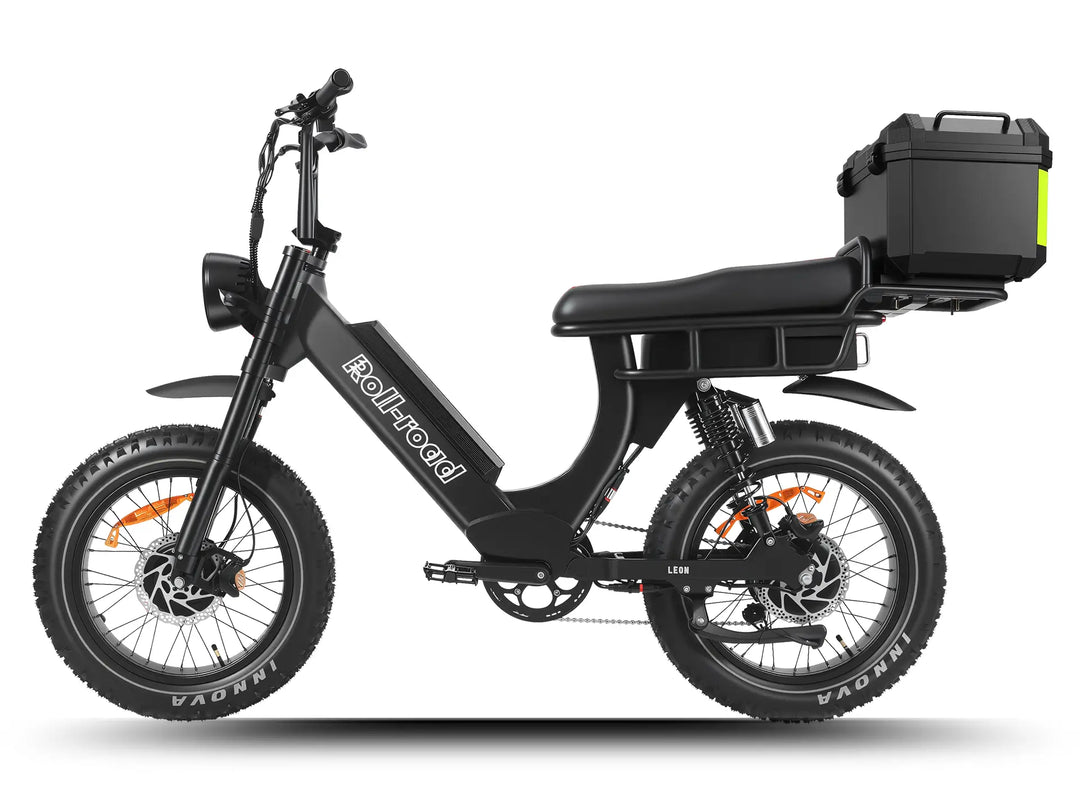 Black LEON e-bike with 2-person seat and cargo trunk, powered by dual motors for carrying passengers and gear.